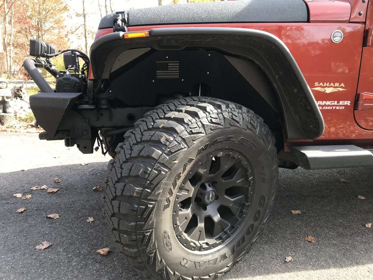 Front driver's side tire rim hood bumper.jpg